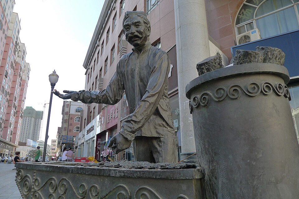 Bronze sculpture on the pedestrian street in Aksu
