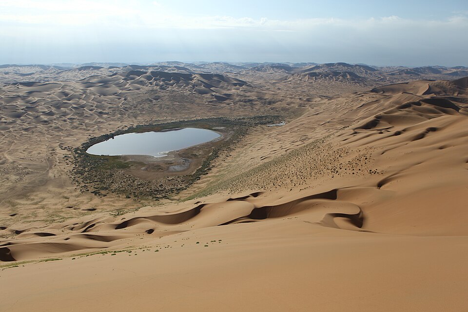 Steep slopes of Bilutu Peak, the highest dune in the Badain Jaran Desert