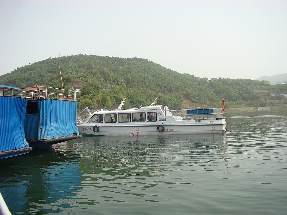 Tour boats moored at a pier on Yinghu Lake in Ankang