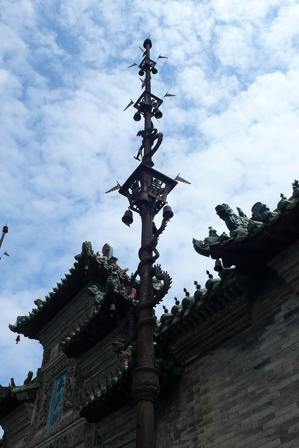Iron flagpoles outside Huaxilou in Bozhou Anhui