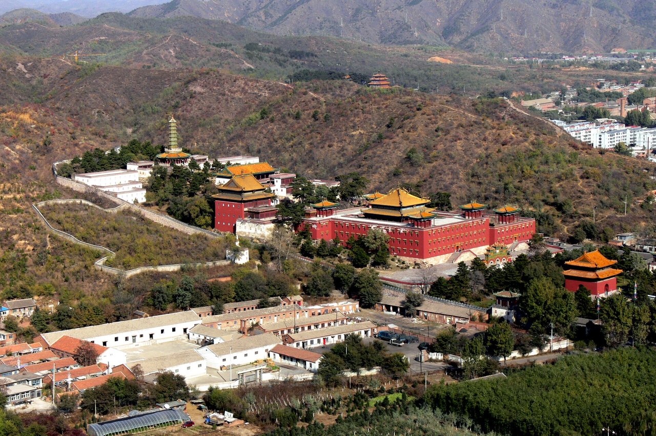 Xumi Fushou Temple seen from above on its hillside with the glazed pagoda at the top