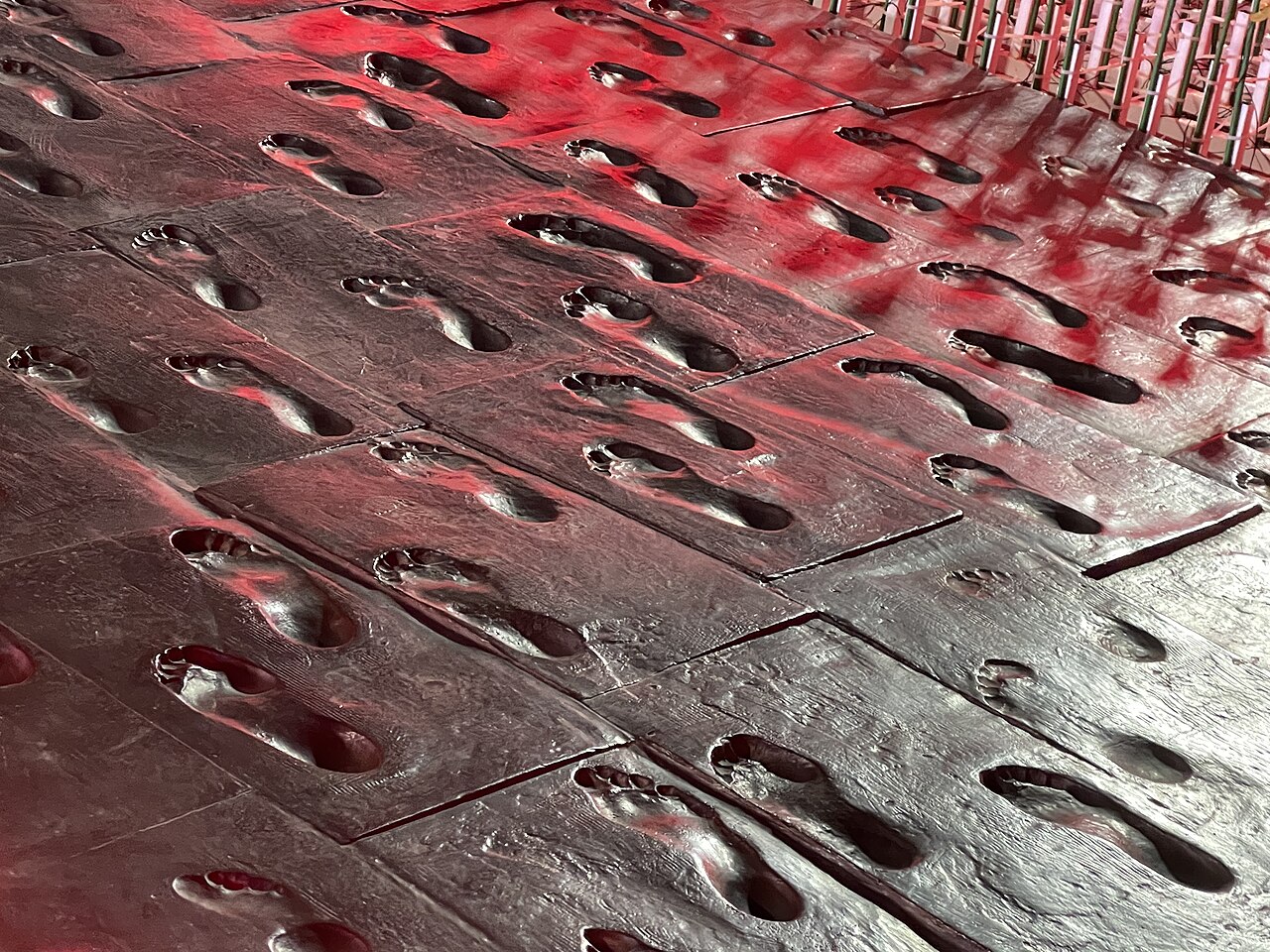 bronze footprints set into the pavement at Xinghai Square