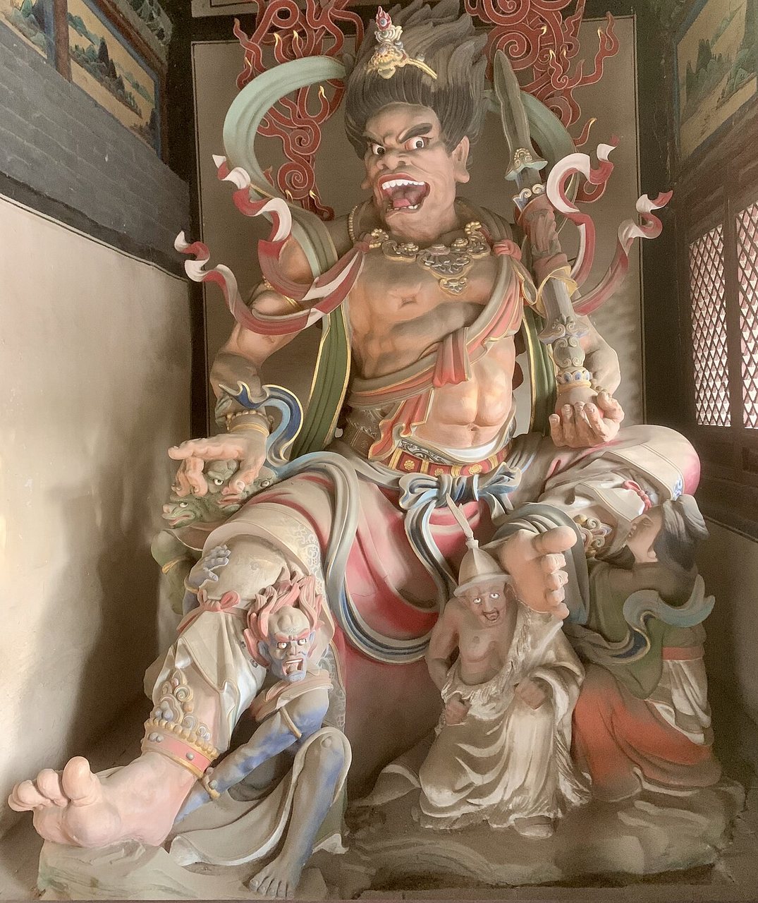 Painted standing figure of a guardian deity in Huayan Temple