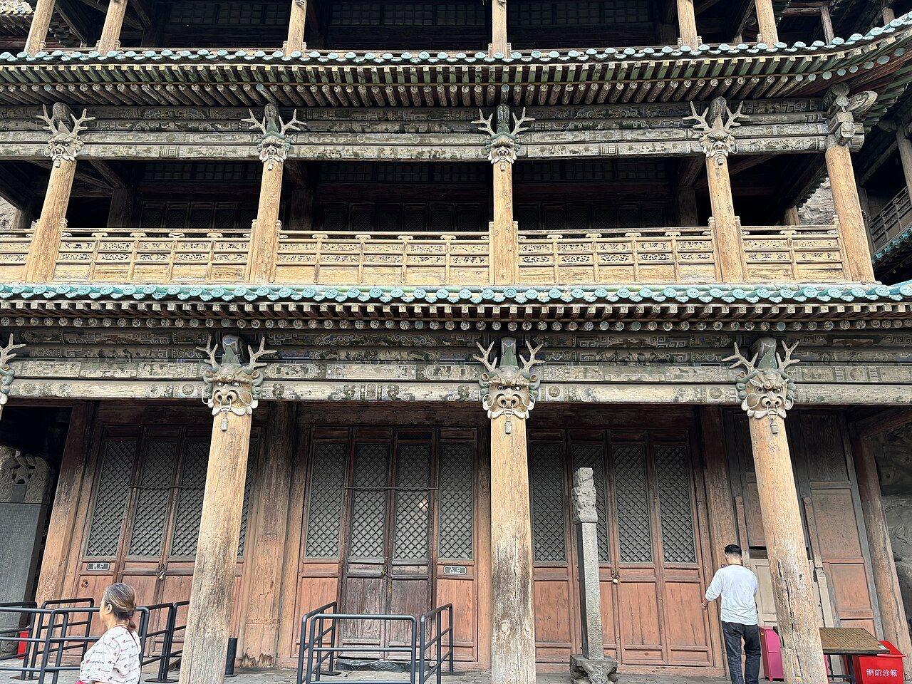 Multi-storey timber facade built in front of Cave 6 at Yungang