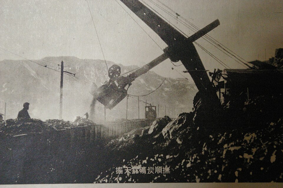 Historic Fushun open-pit coal mine landscape