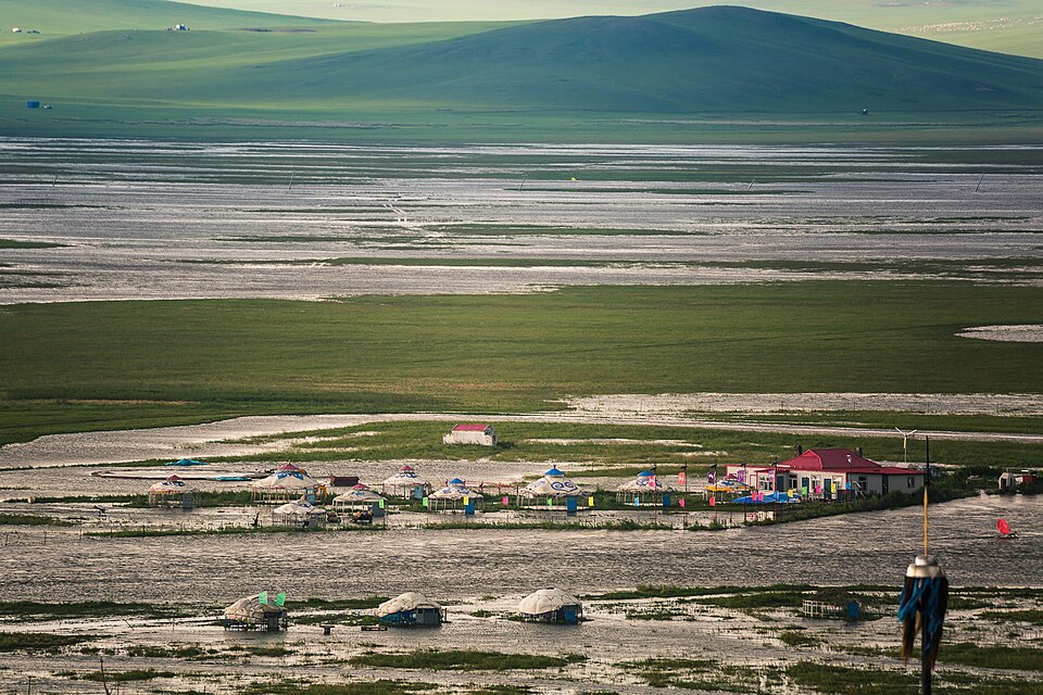 Pools of rainwater lying on Hulunbuir grassland after a summer storm