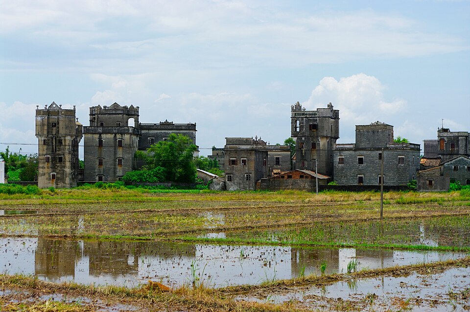 Ornate upper storeys and balcony of a Kaiping diaolou tower