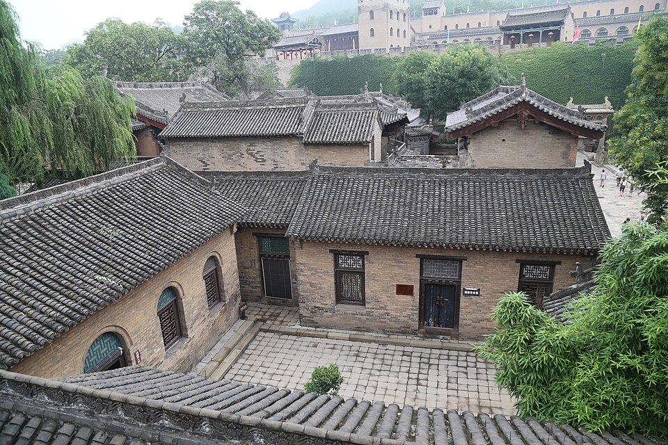 Grey brick courtyards and tiled roofs inside Huangcheng Xiangfu