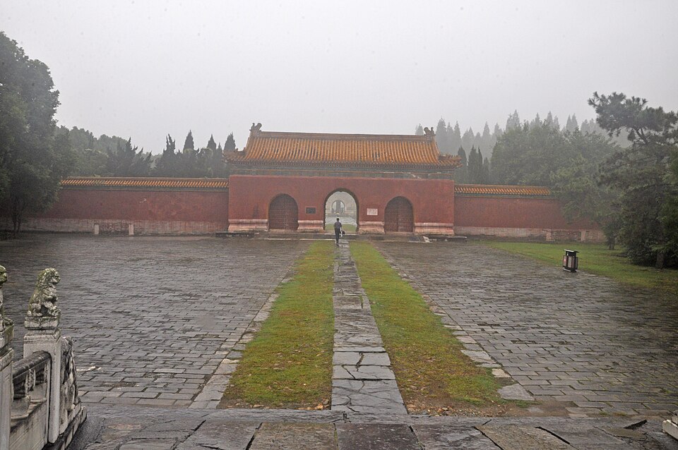 Red-walled inner gate with yellow glazed roof at Ming Xianling