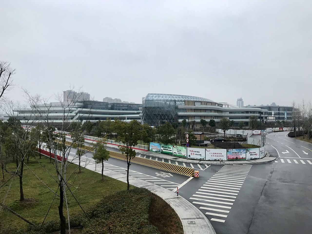 Modern glass towers of Ruicheng International Plaza seen from Shuanglong Bridge
