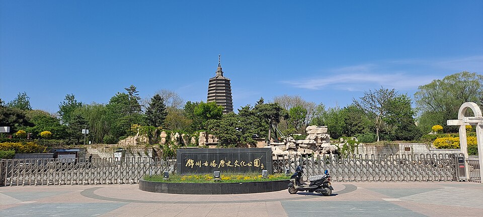 Tree-lined paths and old buildings in Guta Historic and Culture Park, Jinzhou