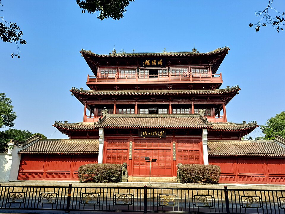 Three-storey Xunyang Tower with upturned eaves beside the Yangtze in Jiujiang