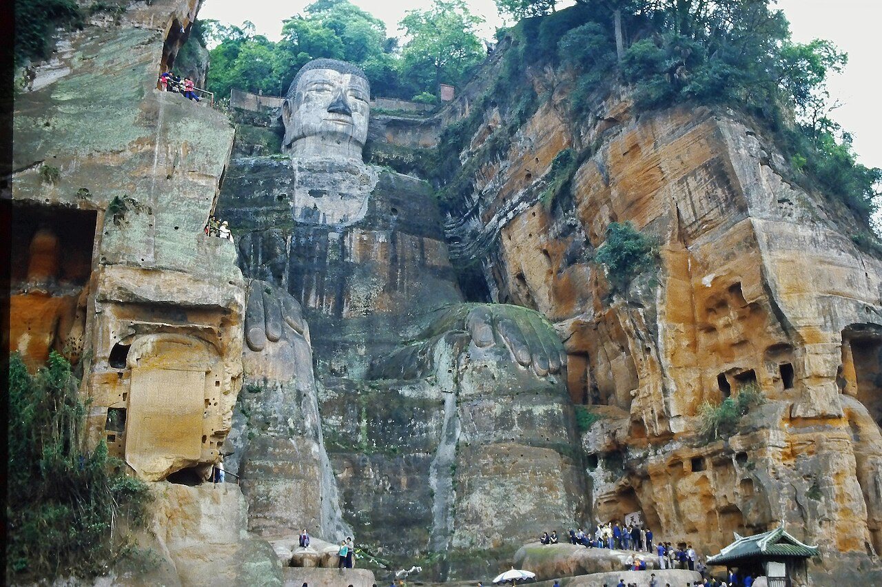 The head of the Leshan Giant Buddha beside the cliff and the plank road niches