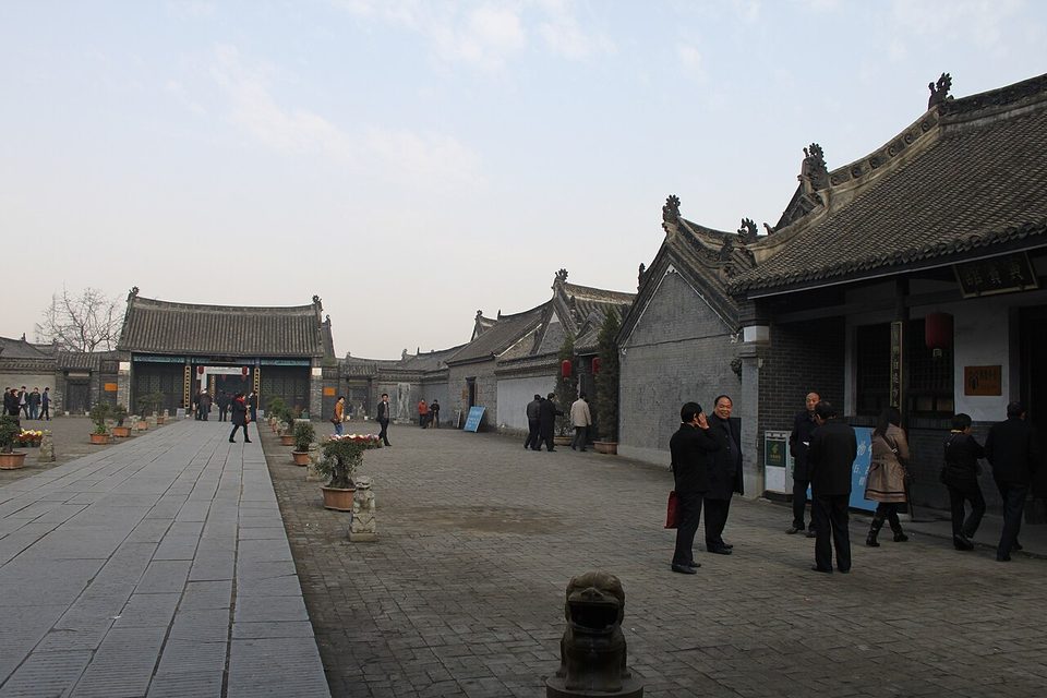 Long stone-paved courtyard and side halls along the axis of the Neixiang yamen