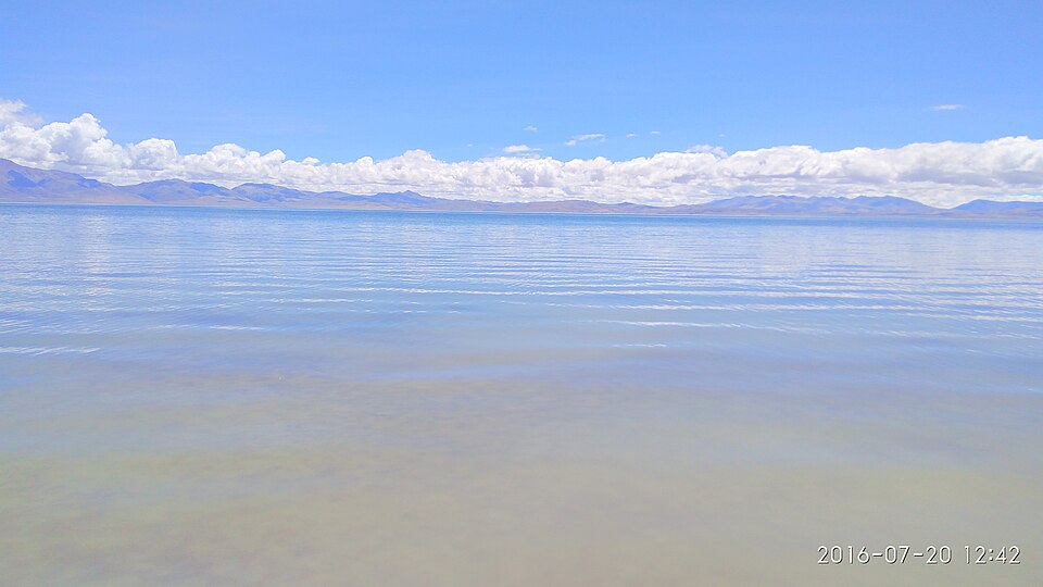 Lake Manasarovar shoreline under open sky in Ngari Tibet