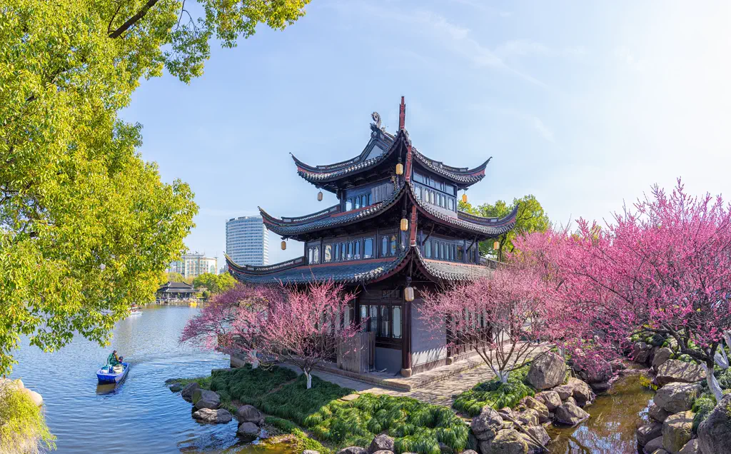 A Moon Lake pavilion with spring bloom