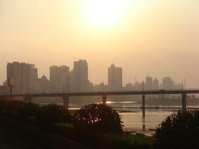 Qingyuan city skyline on the Beijiang River at Xiaoshi