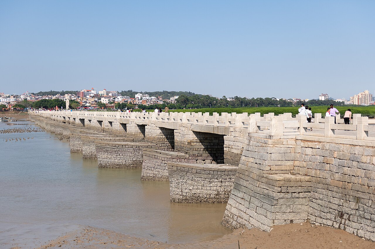 Long low stone deck of Luoyang Bridge across the river mouth in Quanzhou