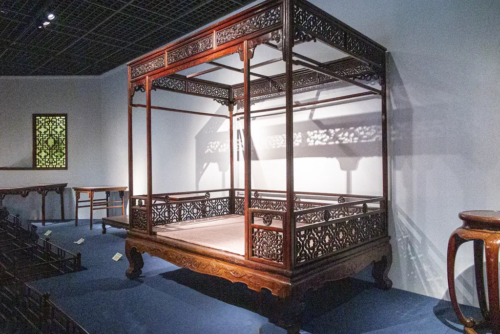 Carved antique canopy bed in the Shanghai Museum furniture collection