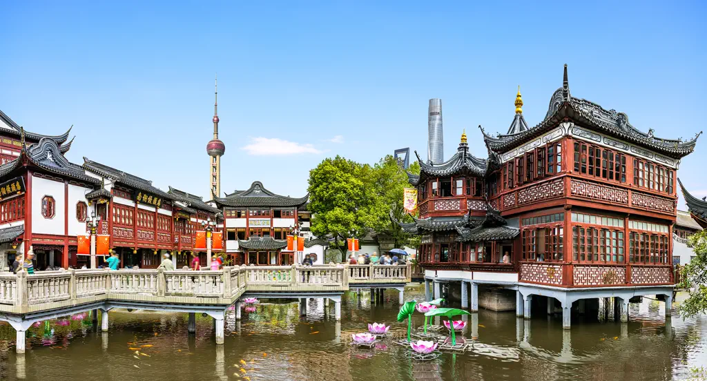 Zigzag bridge in the Yuyuan bazaar with the Pudong skyline behind