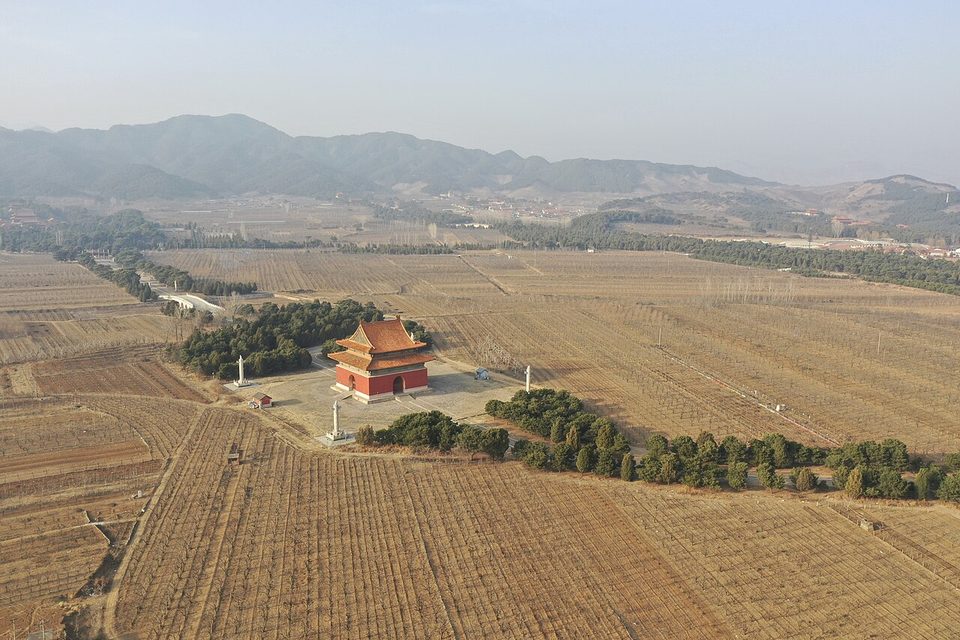 Great Stele Pavilion on the spirit way of the Eastern Qing Tombs seen from above with fields around it