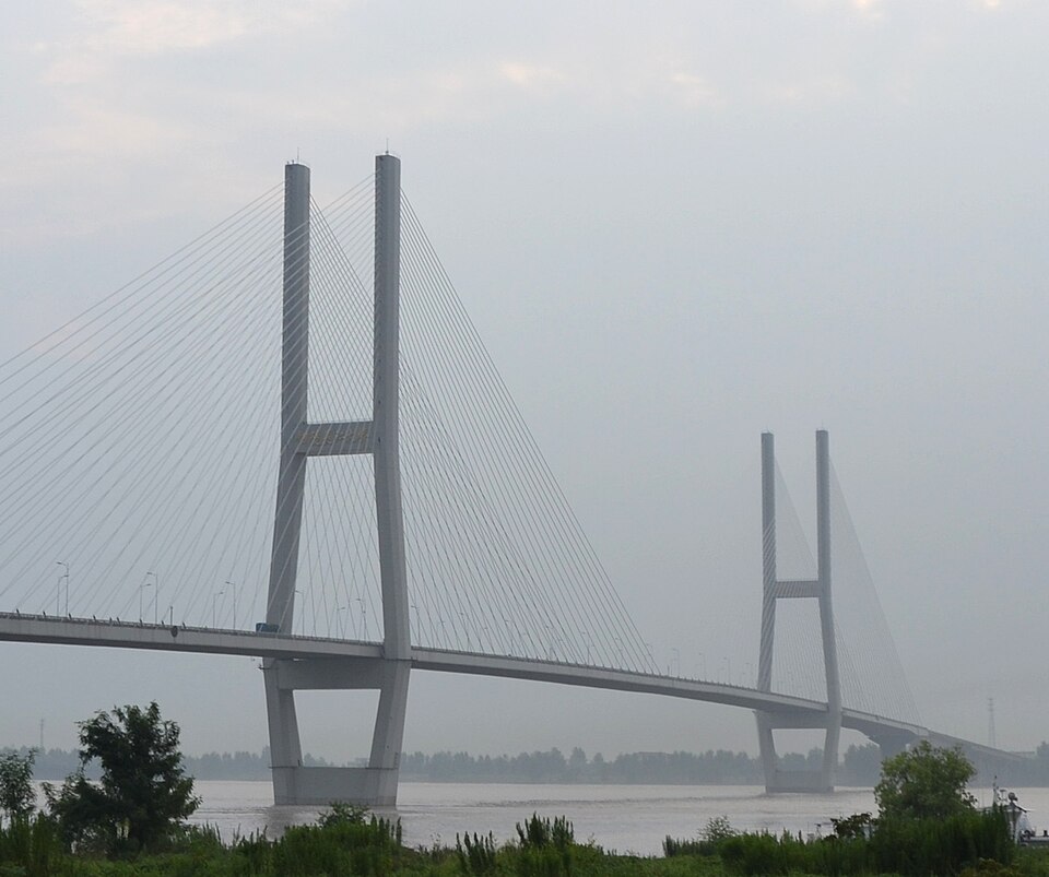 Cable-stayed bridge towers rising over the Yangtze River at Tongling