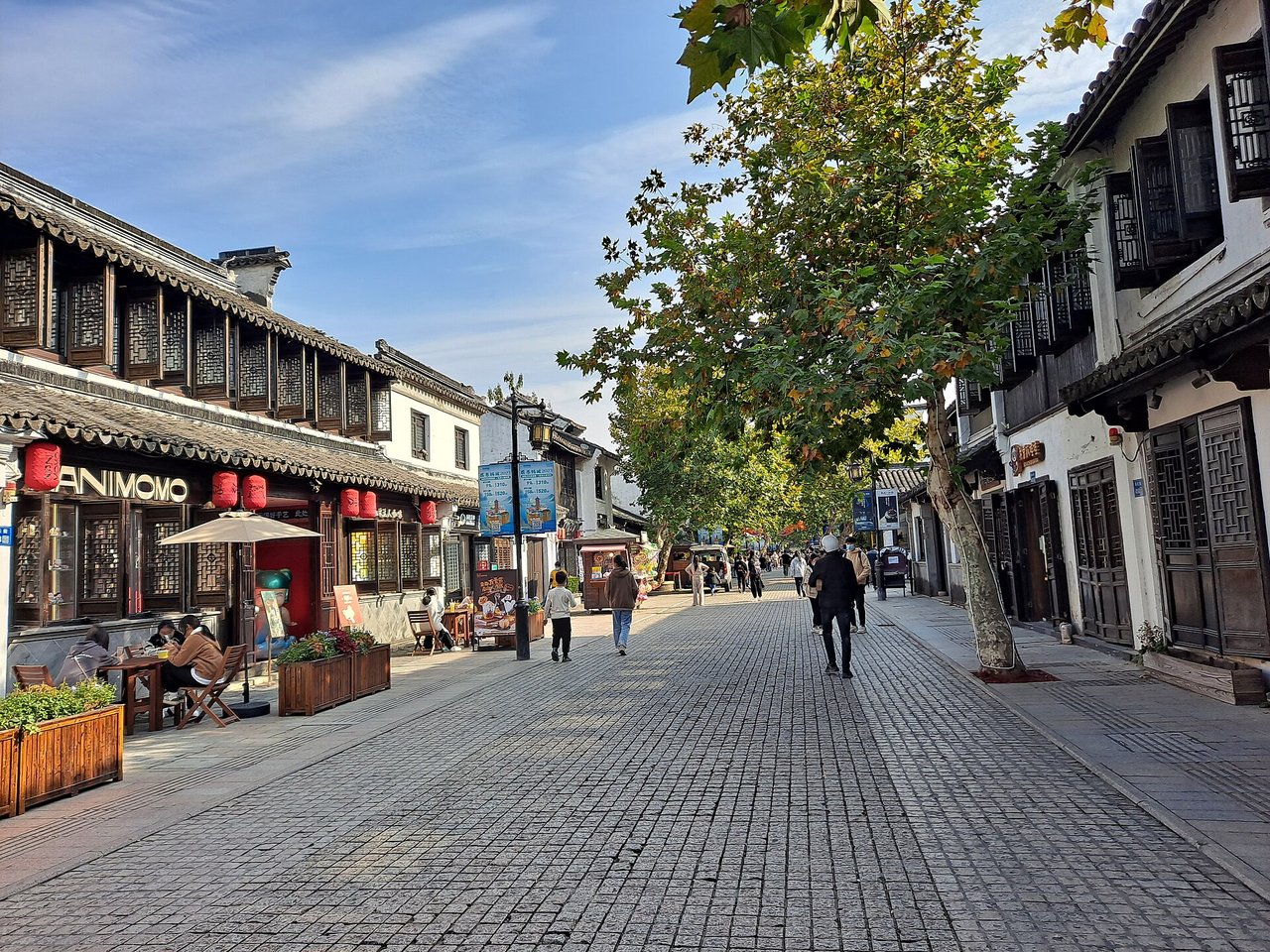 Nanchang Street with restored shopfronts and plane trees