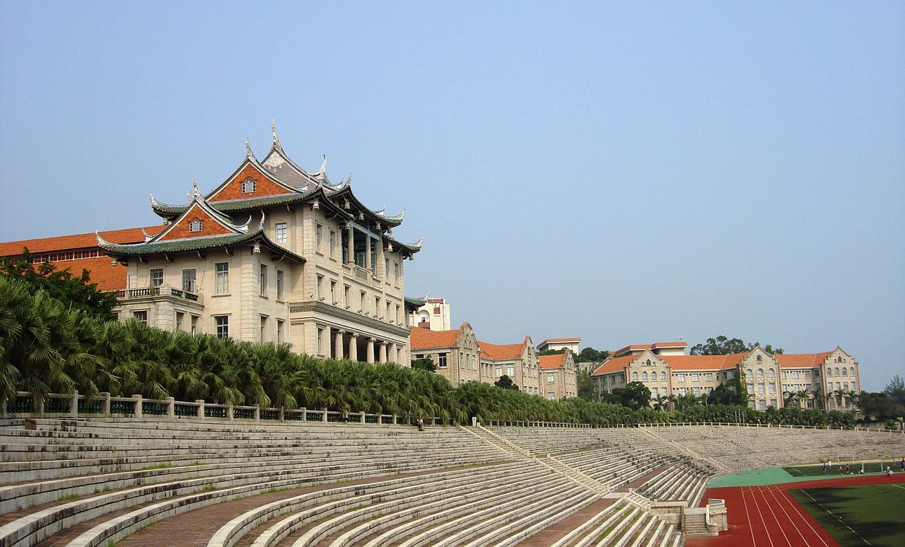Jiannan Auditorium above the curved terraces of Shangxian Field at Xiamen University